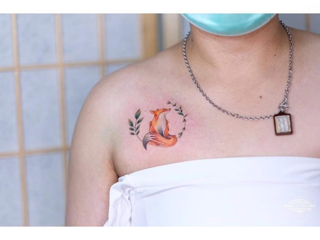 Charming fox tattoo with floral accents Tattoo Design