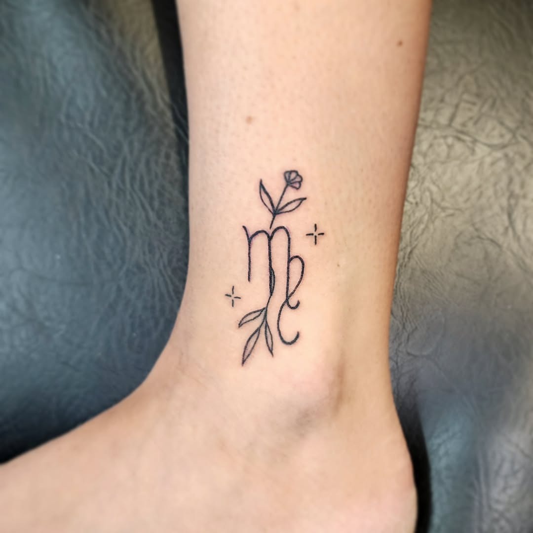 Elegant Virgo tattoo with floral elements Tattoo Design