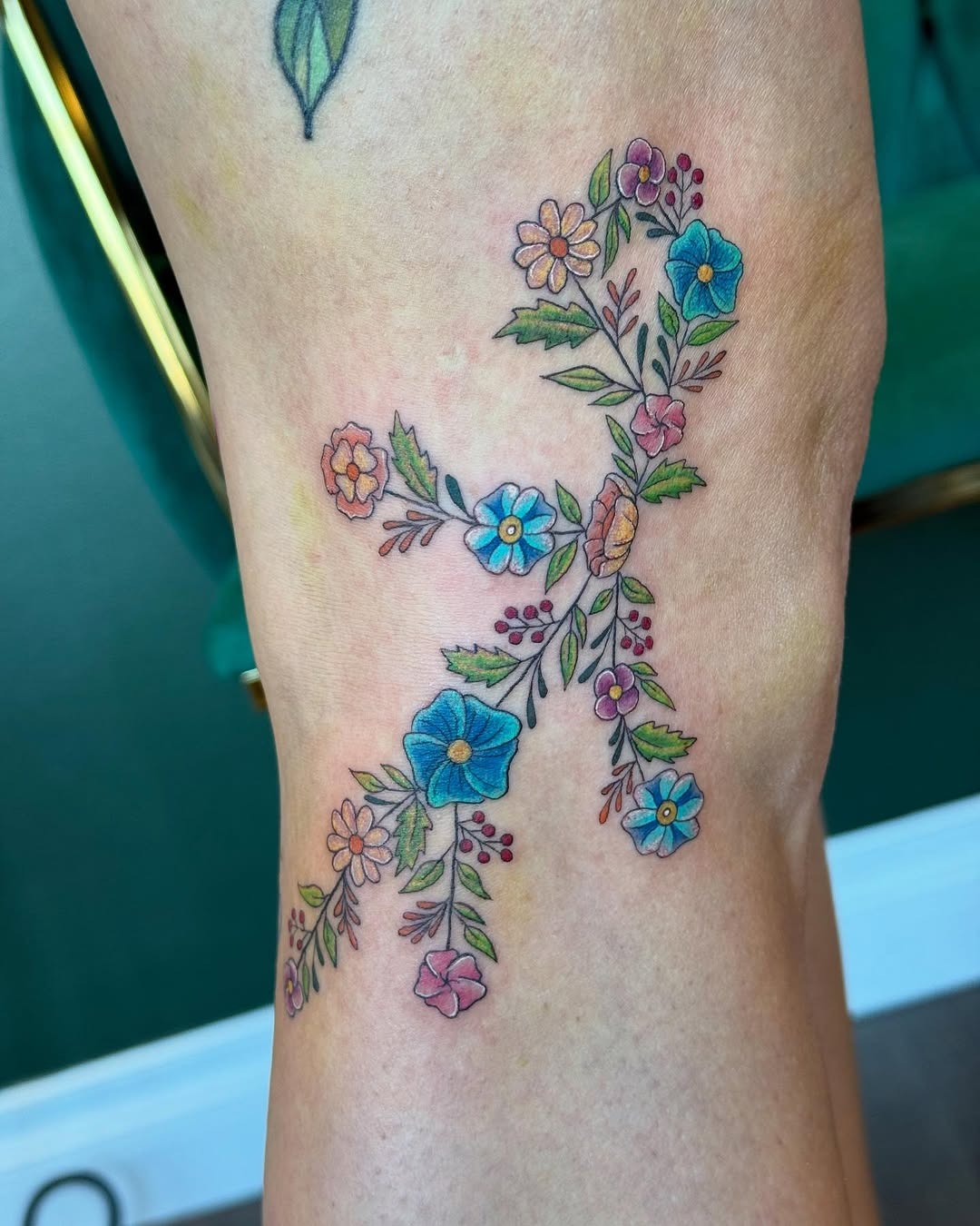 Floral Virgo Tattoo with Colorful Accents Tattoo Design