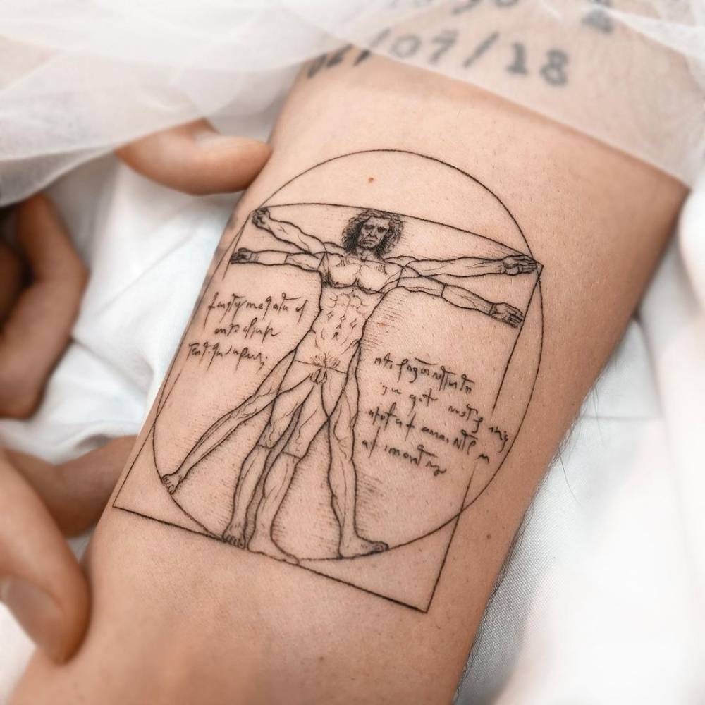 Minimalist Vitruvian Man with Handwritten Notes Tattoo Design