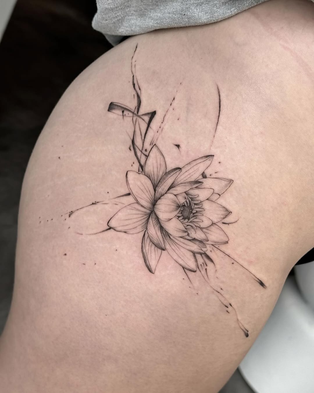 Abstract Fine Line Water Lily on the Thigh Tattoo Design