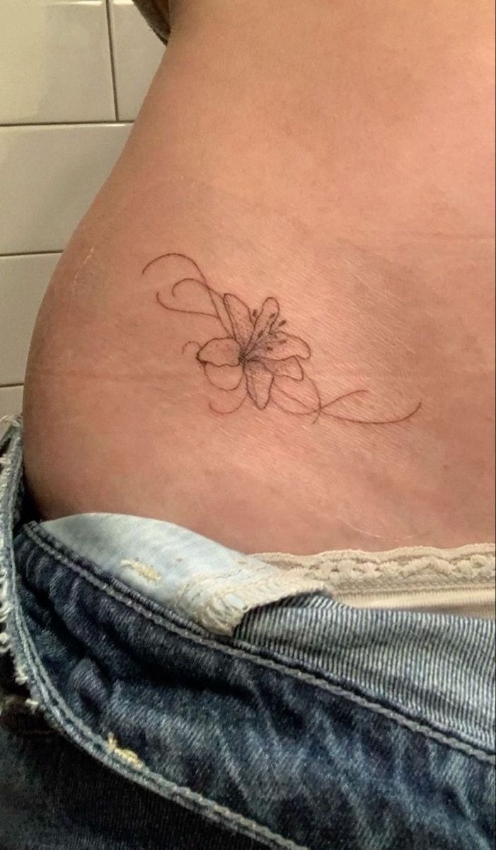Tiny Lower Back Water Lily Line Tattoo Tattoo Design