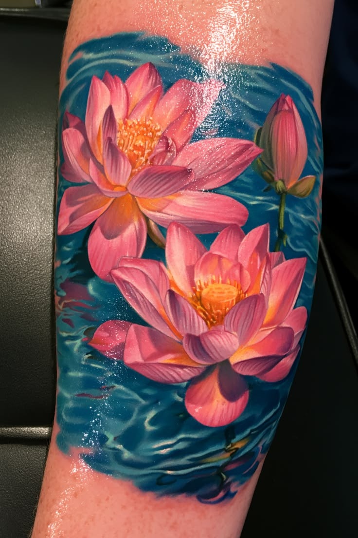 Vivid Pink Water Lilies on Deep Blue Water Tattoo Design