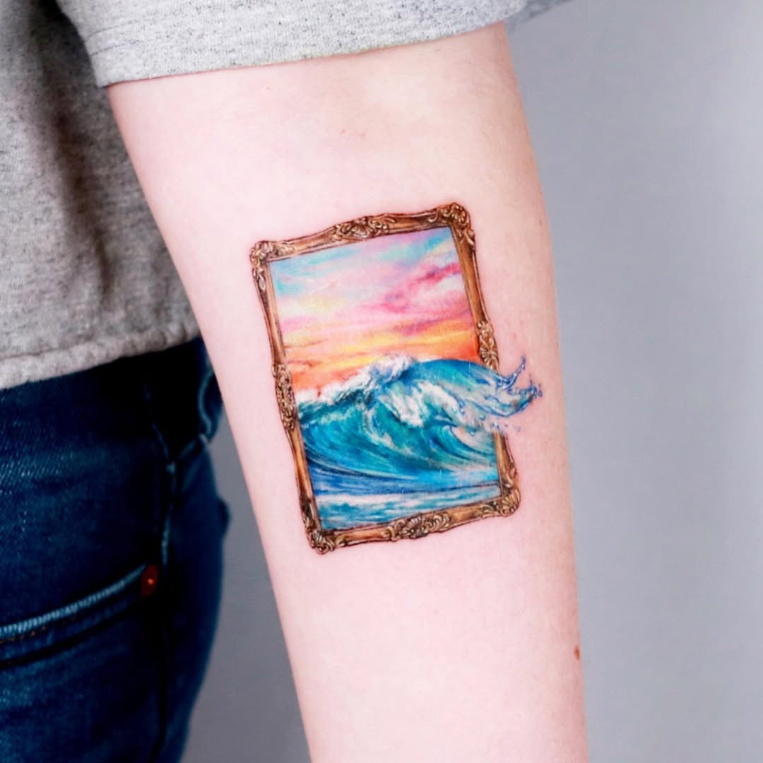 Artfully framed wave tattoo for ocean lovers Tattoo Design
