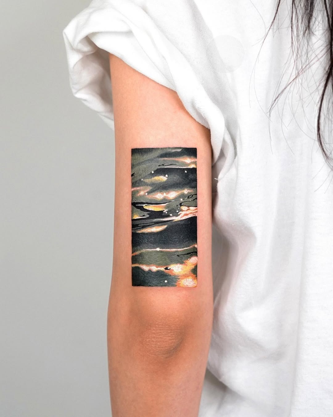 Artistic water illusion tattoo on forearm Tattoo Design