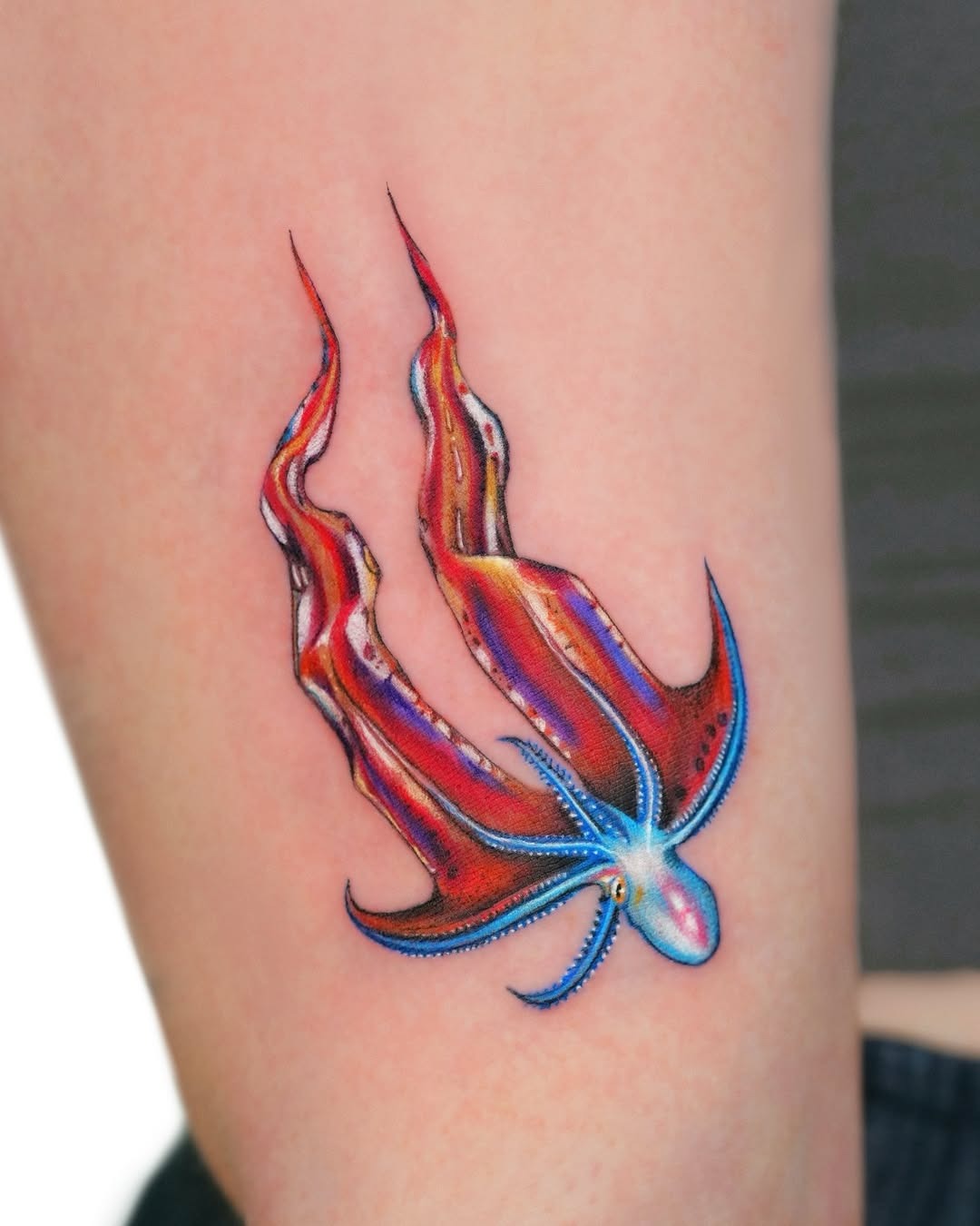 Dynamic octopus tattoo showcasing vibrant colors Tattoo Design