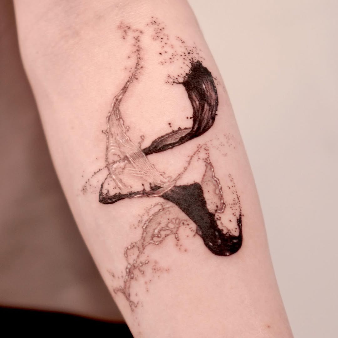 Dynamic water-inspired tattoo showcasing fluid movement Tattoo Design