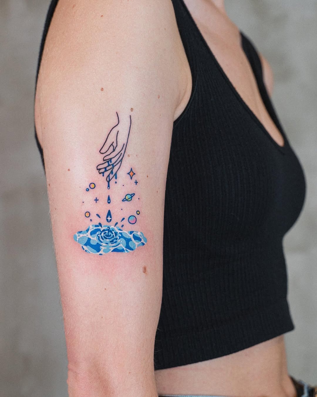 Elegant hand reaching towards a blue rose Tattoo Design