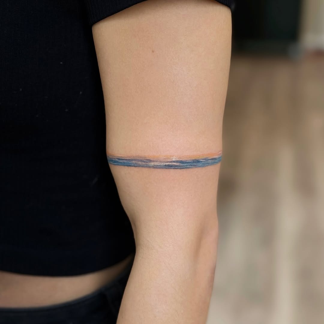Elegant minimalism in water-themed tattoo art Tattoo Design