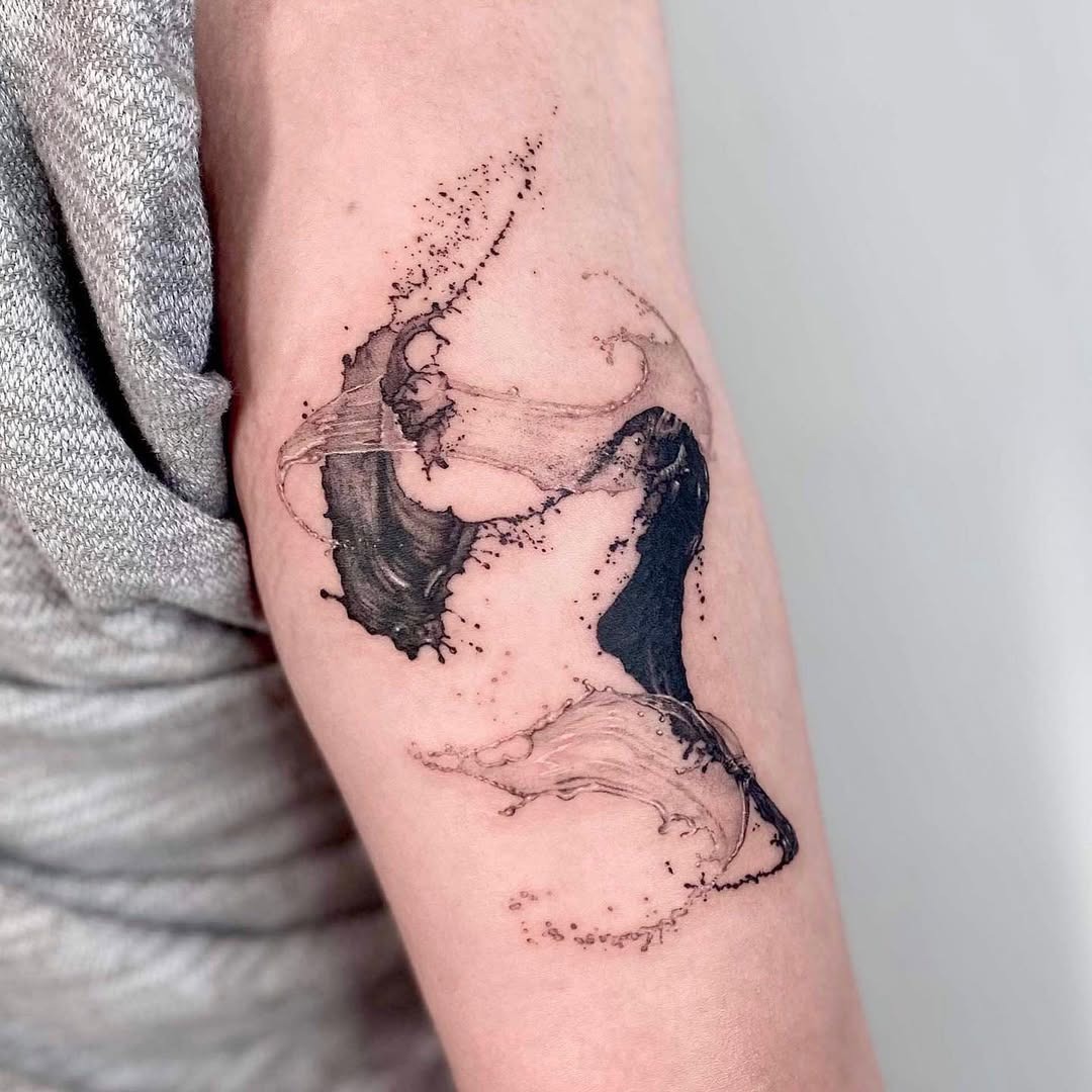 Elegant water swirl tattoo on the arm Tattoo Design