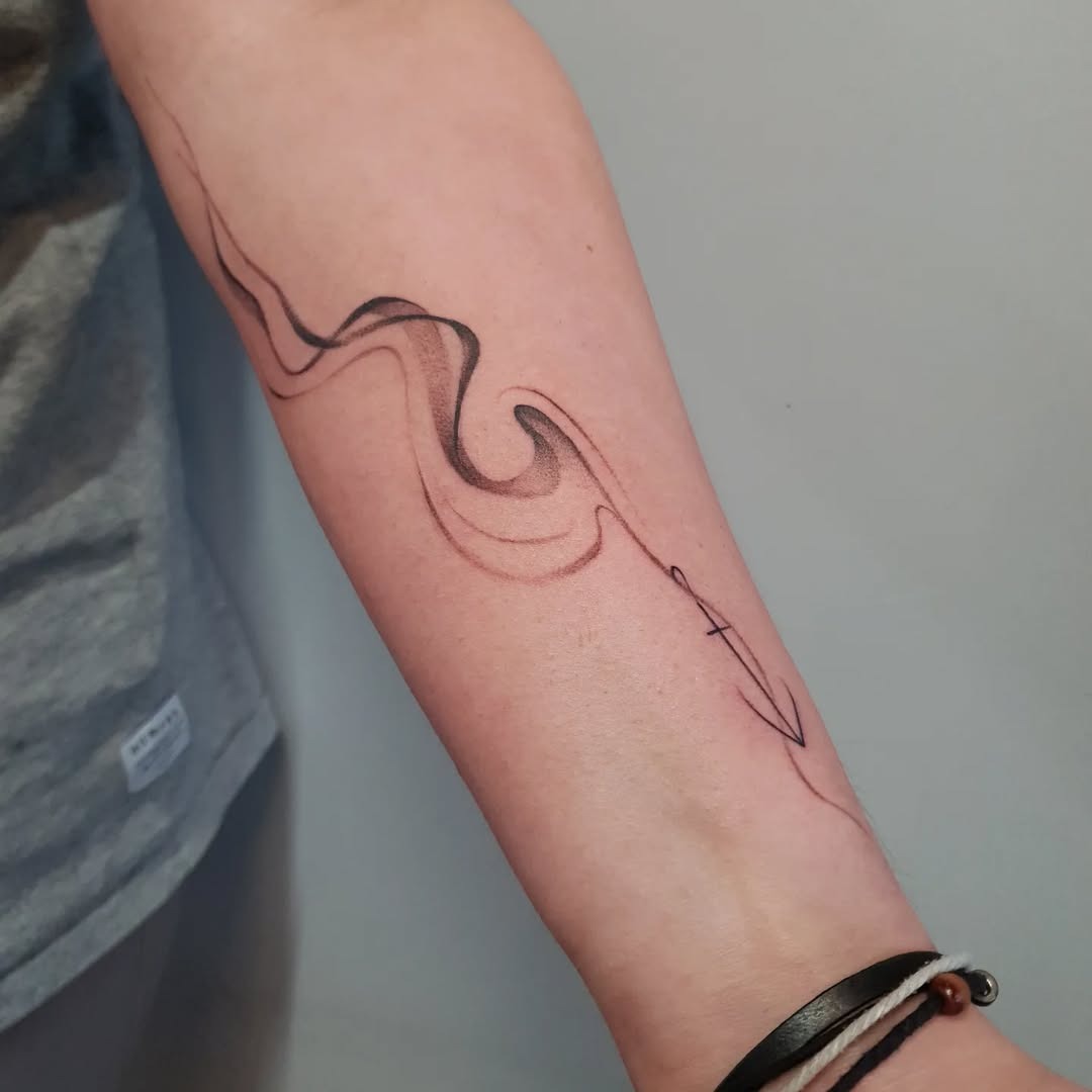 Elegant water wave tattoo on forearm Tattoo Design