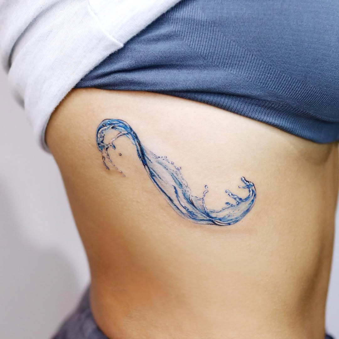 Elegant Wave Tattoo in Refreshing Blue Hues Tattoo Design