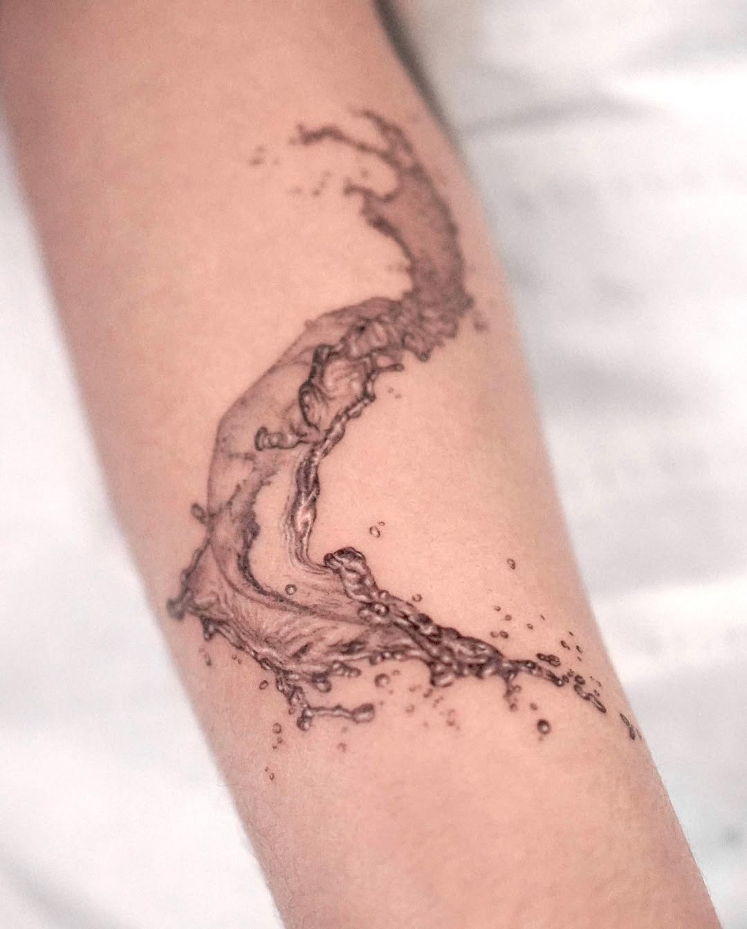 Flowing water tattoo capturing nature's beauty Tattoo Design