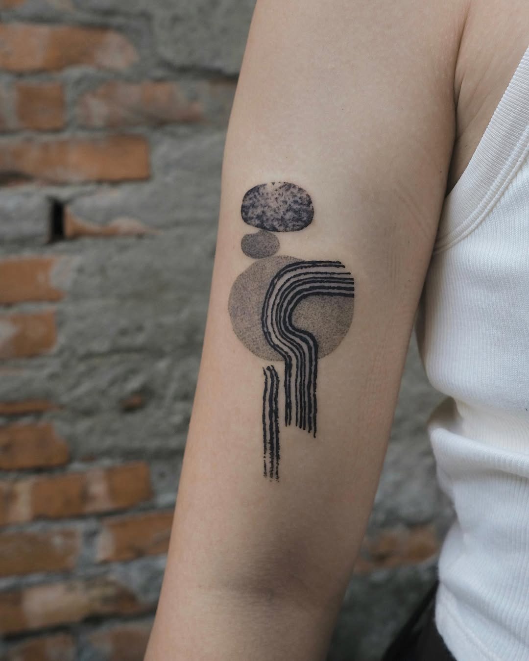 Modern abstract water-themed tattoo showcases unique style Tattoo Design