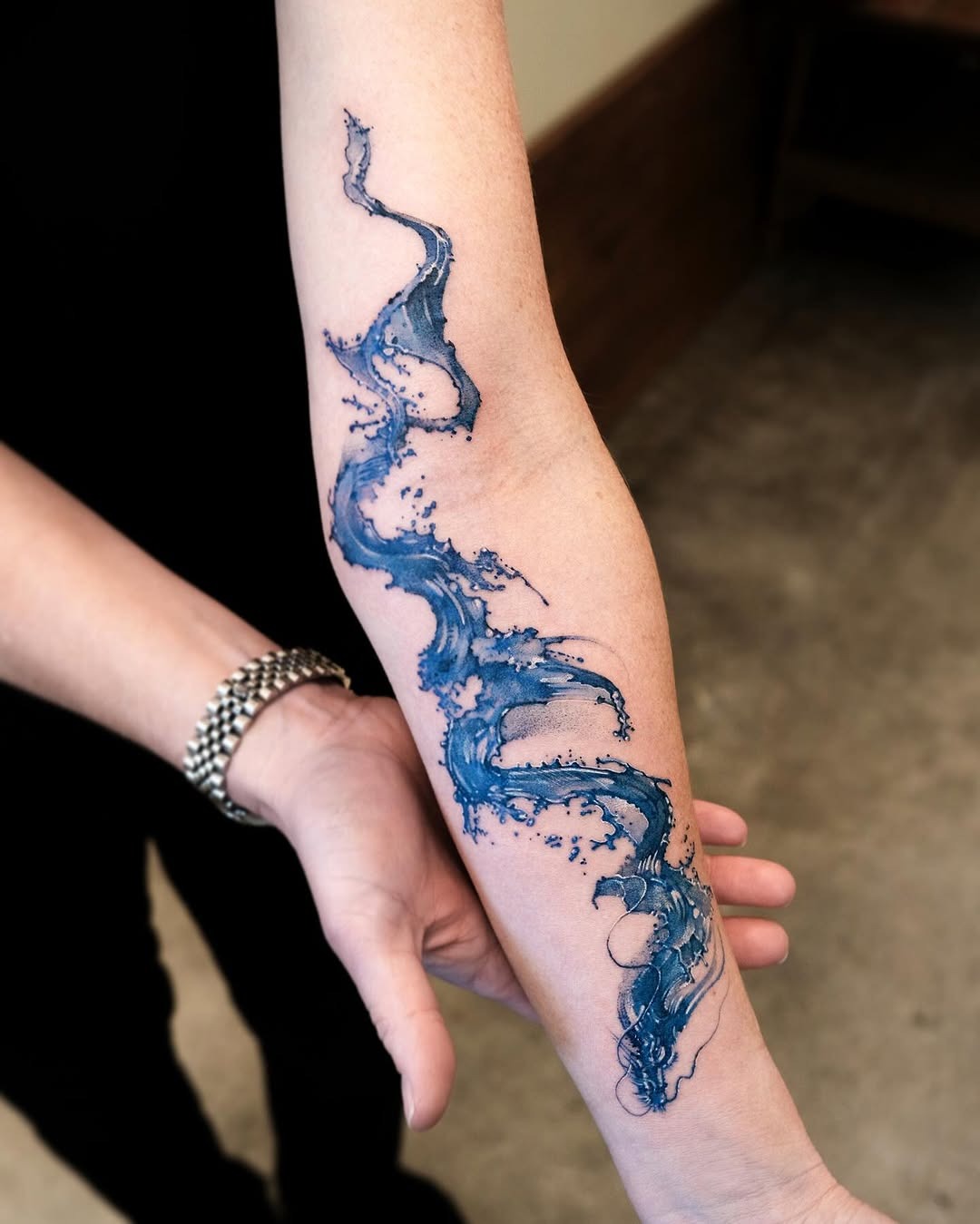 Stunning Water Wave Tattoo on Arm Tattoo Design