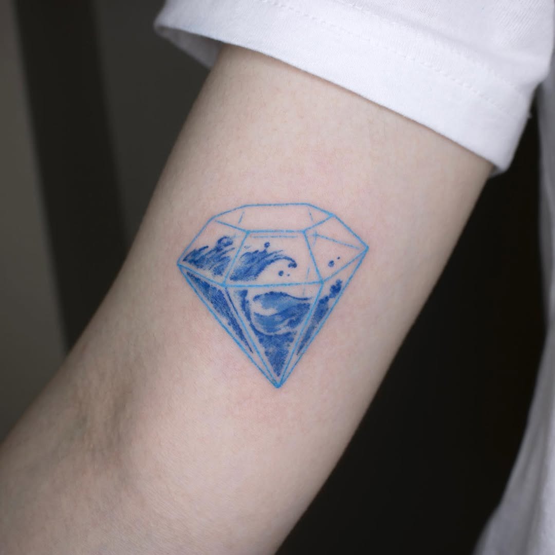 Stylish diamond tattoo with ocean waves Tattoo Design