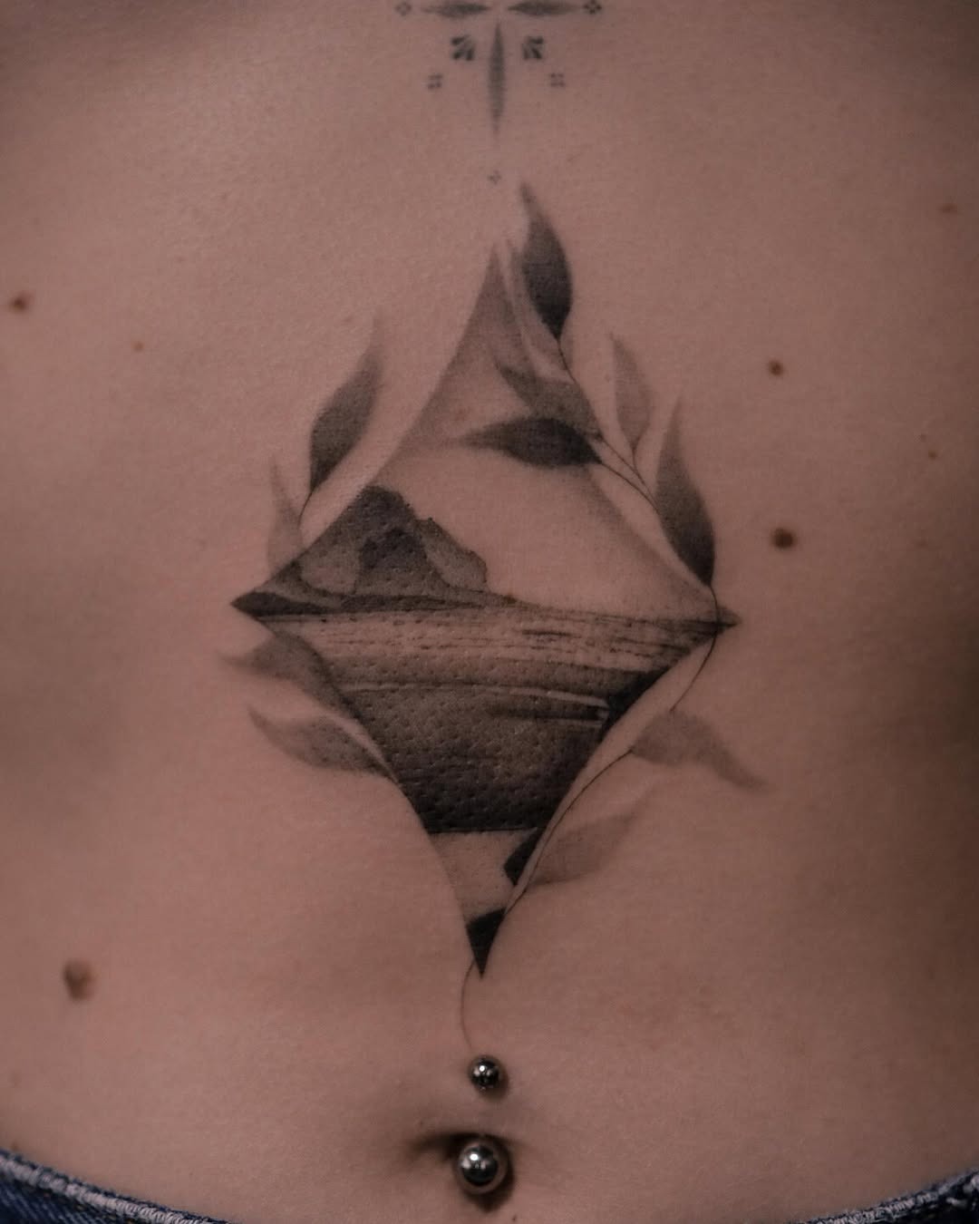 Stylish water tattoo with nature elements Tattoo Design