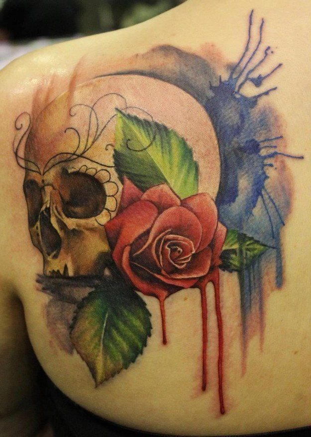 Bold Skull with Red Rose Watercolor Back Tattoo Tattoo Design