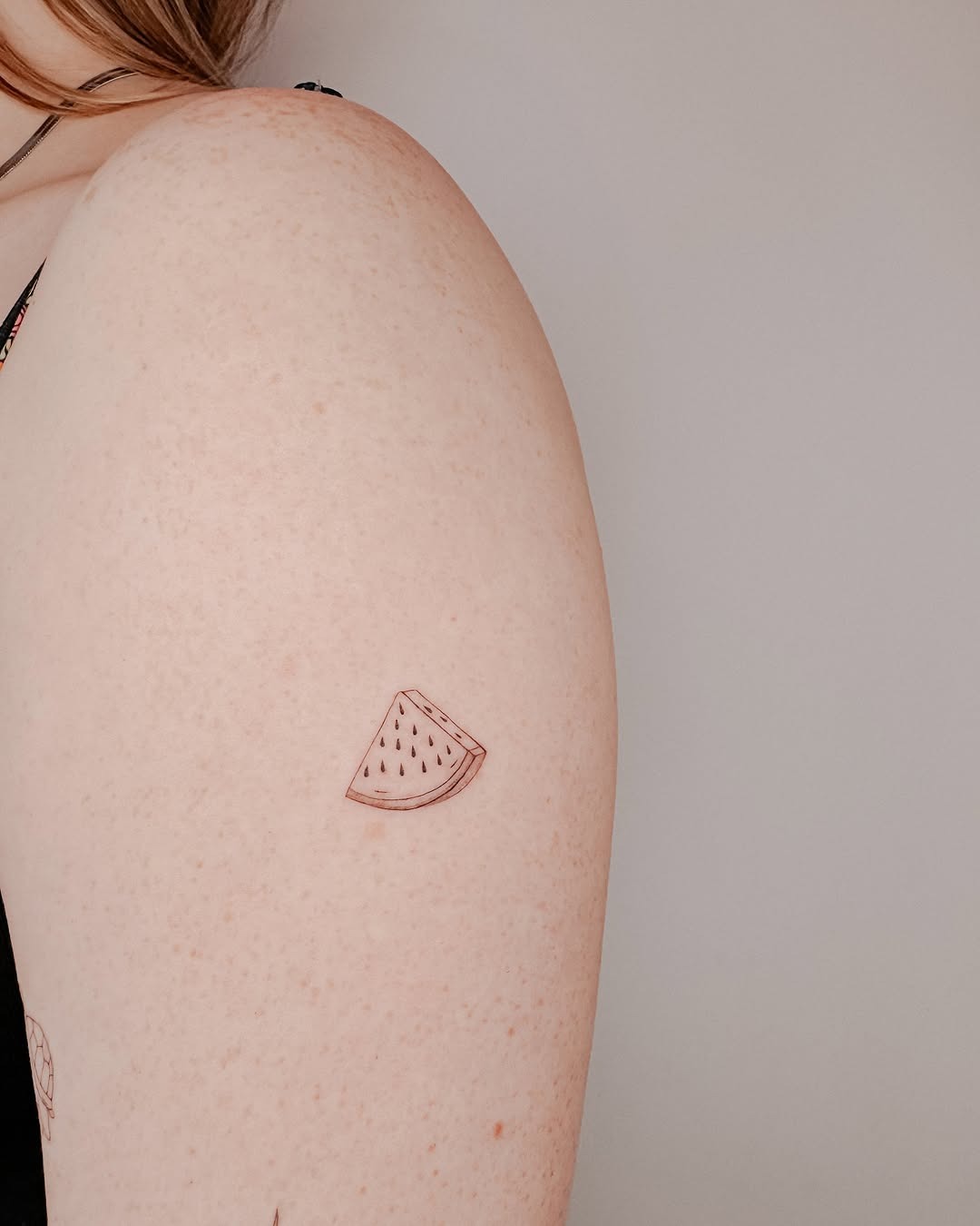 Charming Minimalist Watermelon Tattoo on Arm Tattoo Design