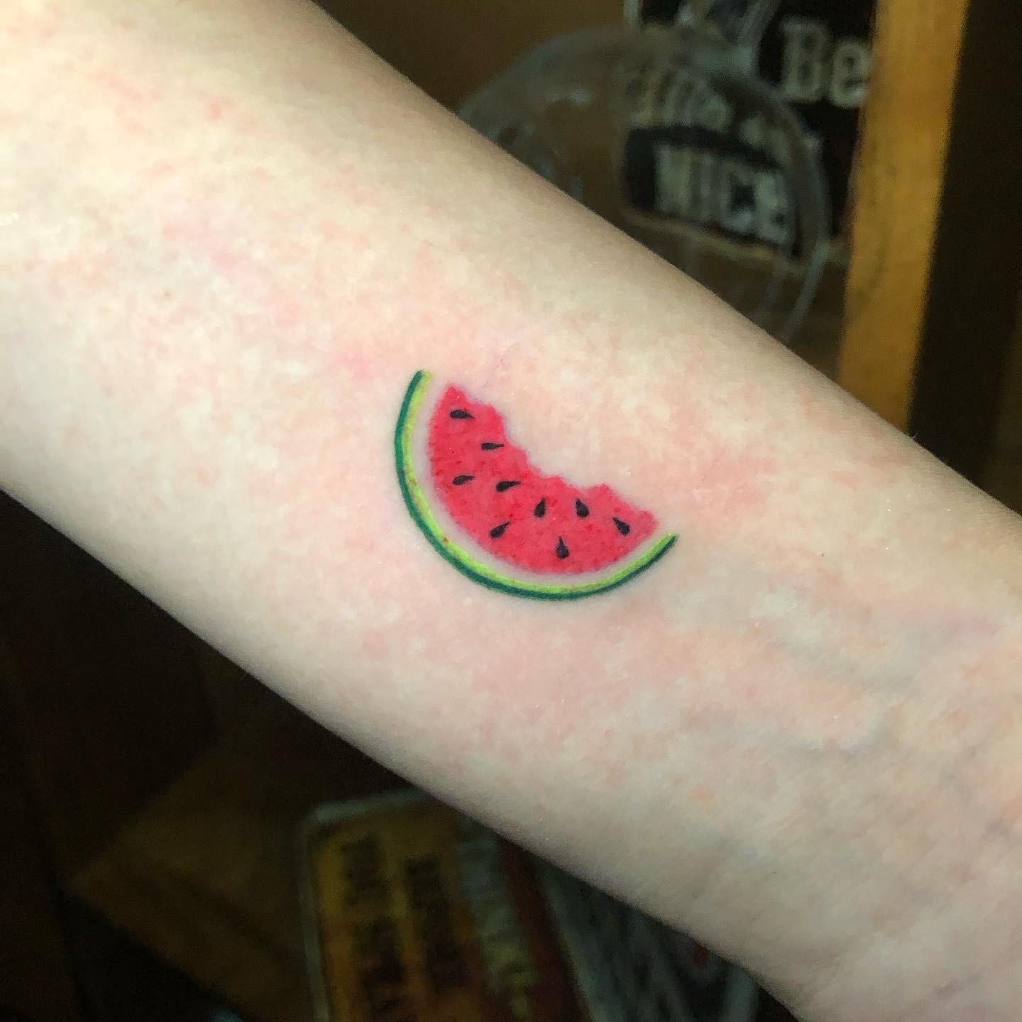 Charming Watermelon Slice Tattoo on Arm Tattoo Design