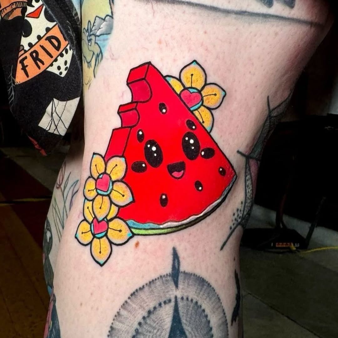 Playful watermelon tattoo with floral accents Tattoo Design
