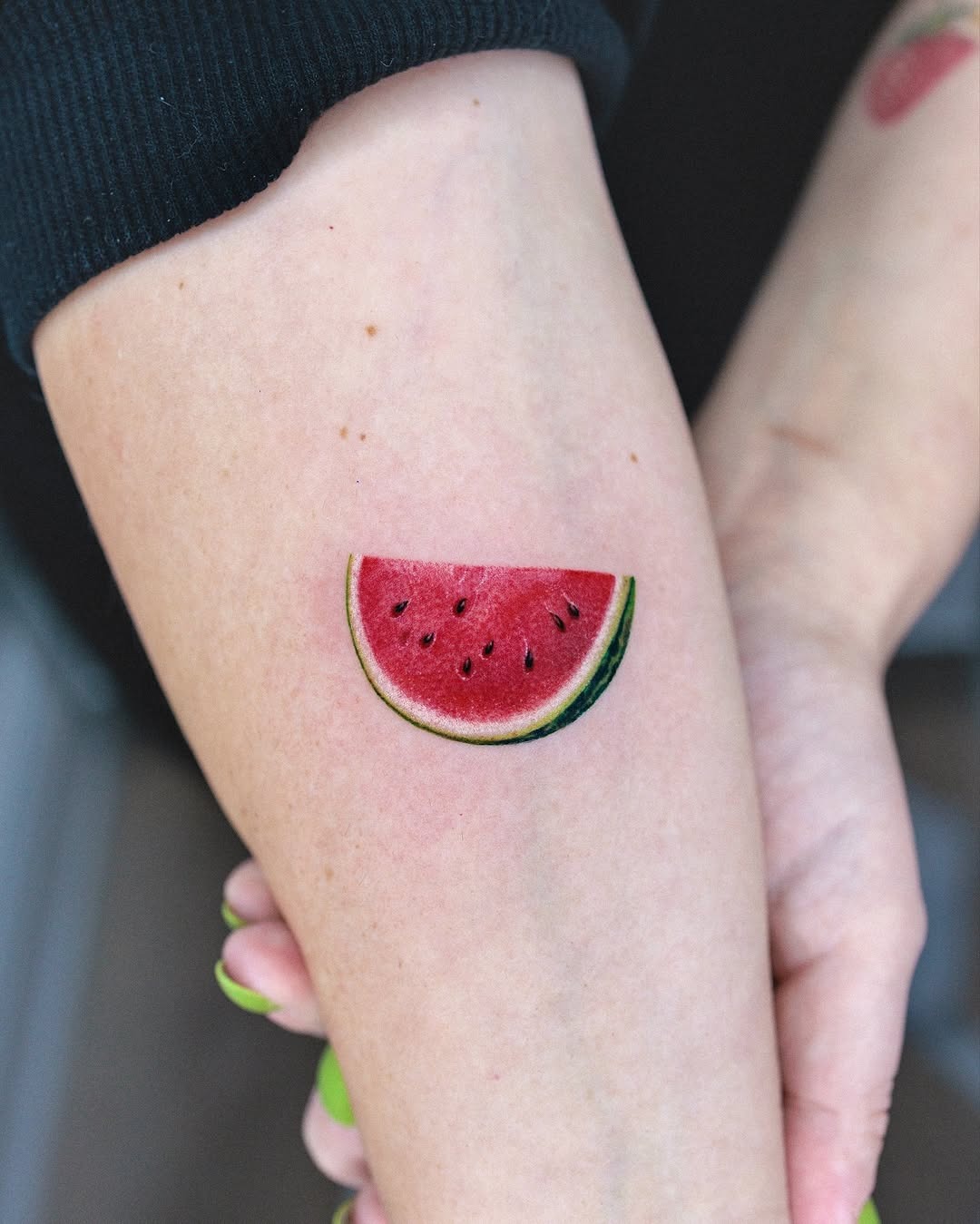 Vibrant Watermelon Slice Tattoo on Skin Tattoo Design