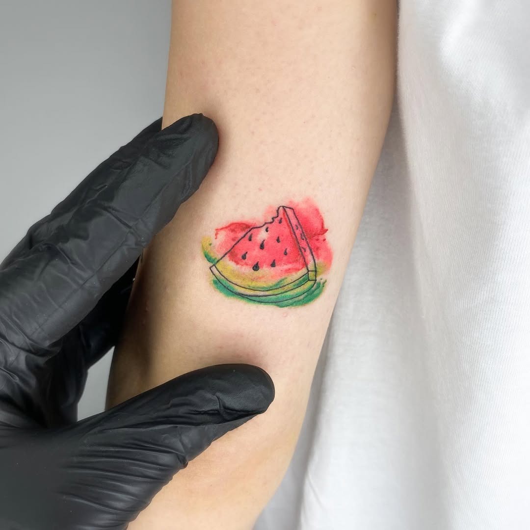 Vibrant watermelon tattoo with artistic flair Tattoo Design