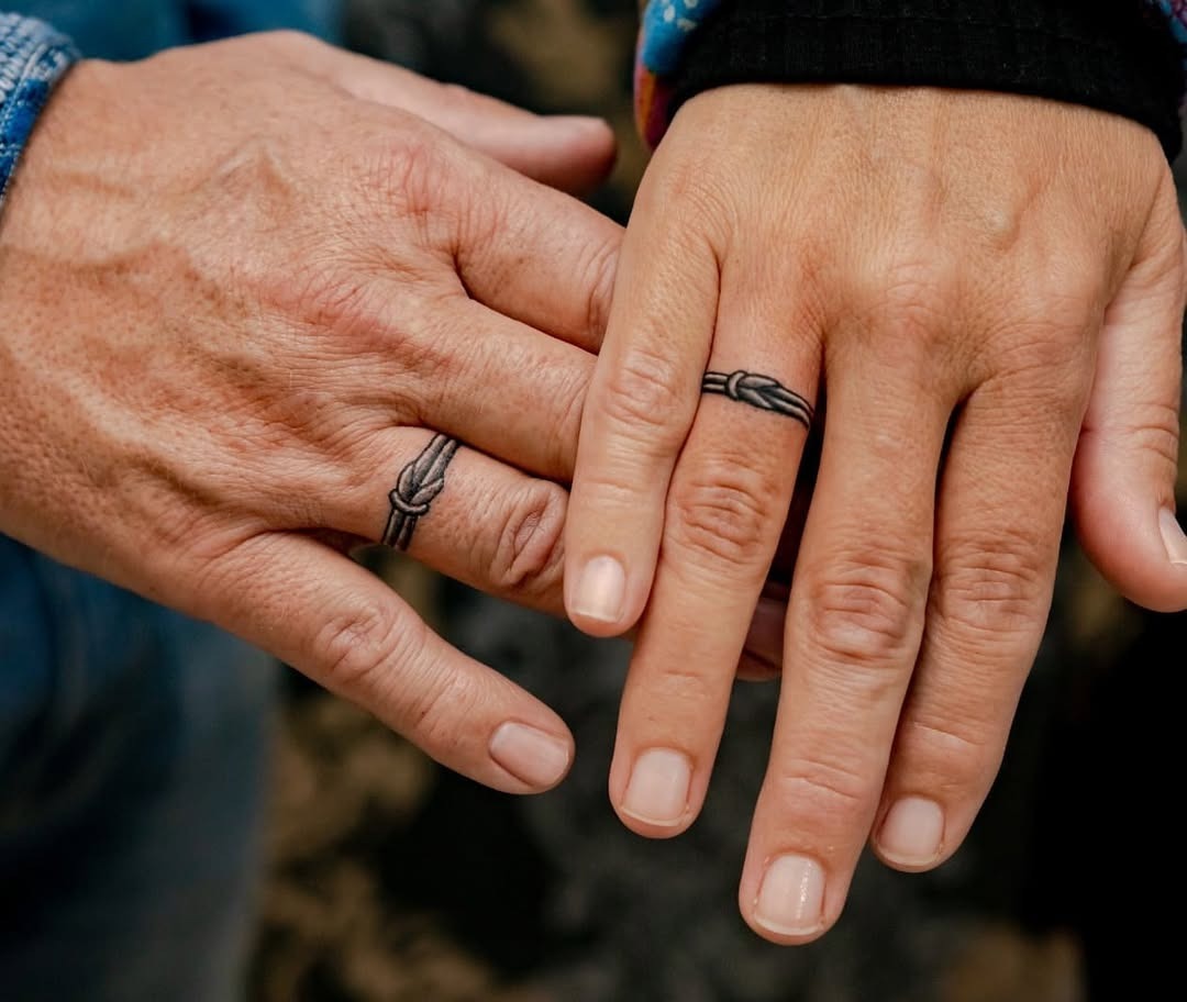 Meaningful wedding ring tattoo inspiration for couples Tattoo Design