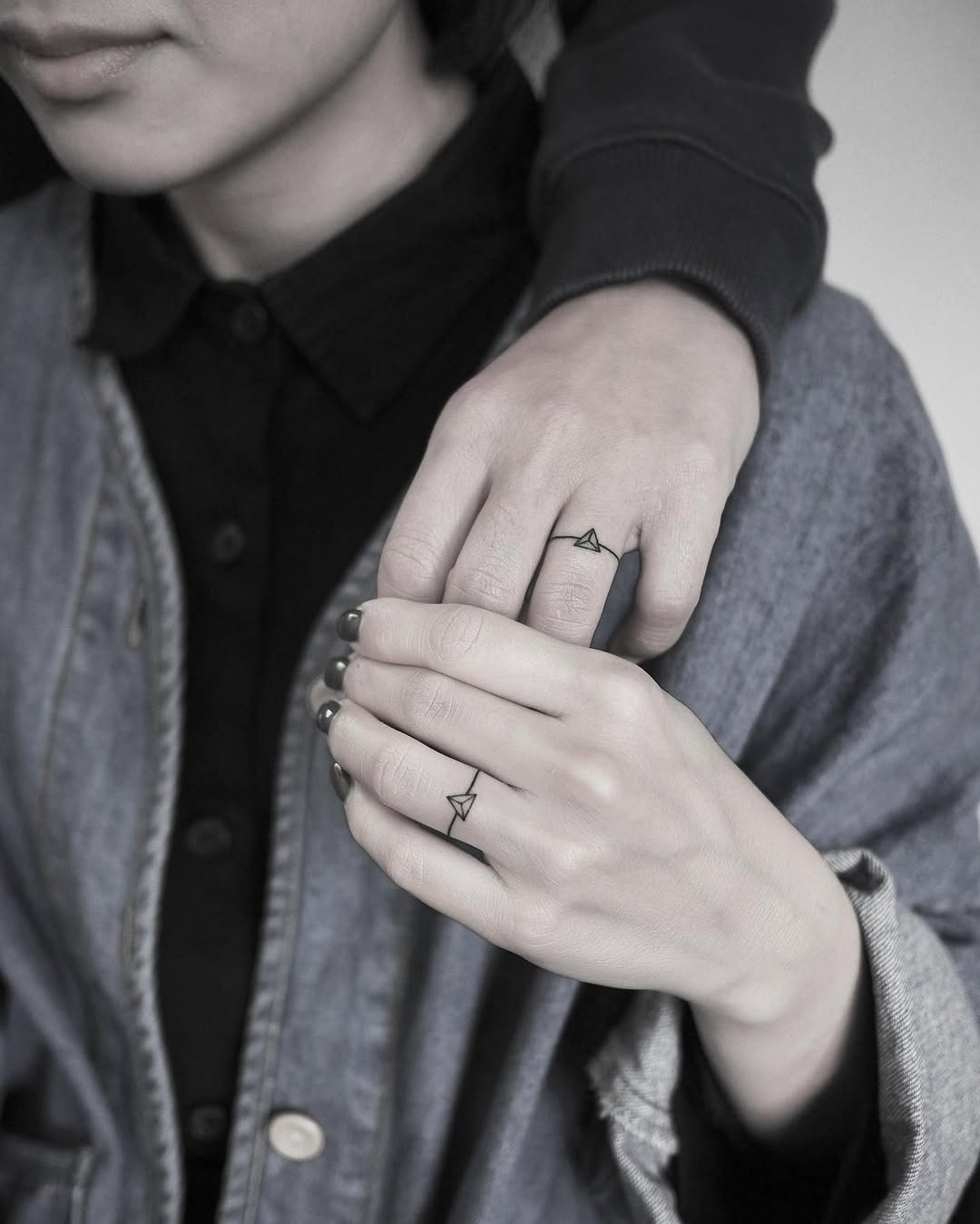 Minimalist wedding ring tattoo for couples Tattoo Design
