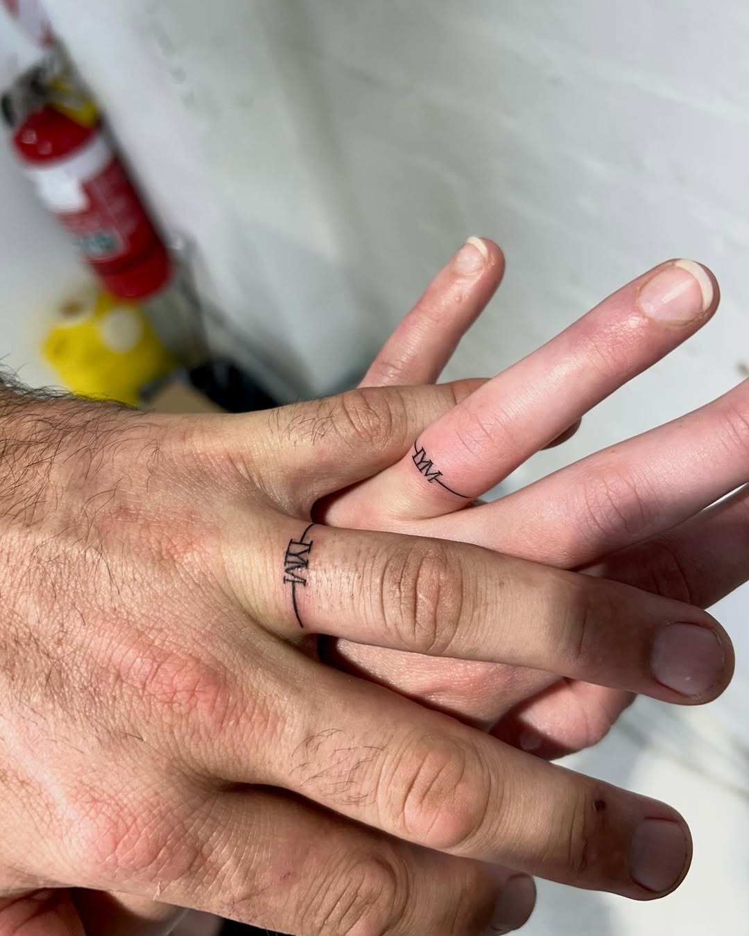 Unique wedding ring tattoos for couples Tattoo Design