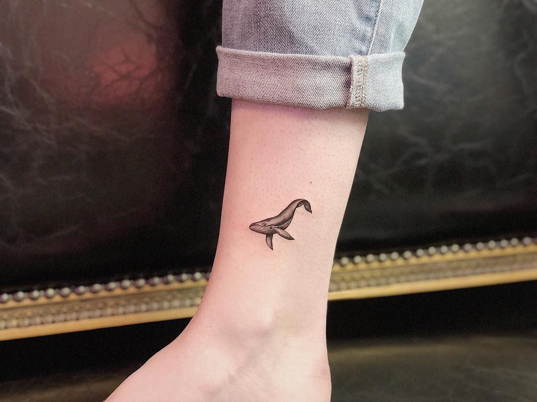 Charming Minimalist Whale Tattoo on the Ankle Tattoo Design
