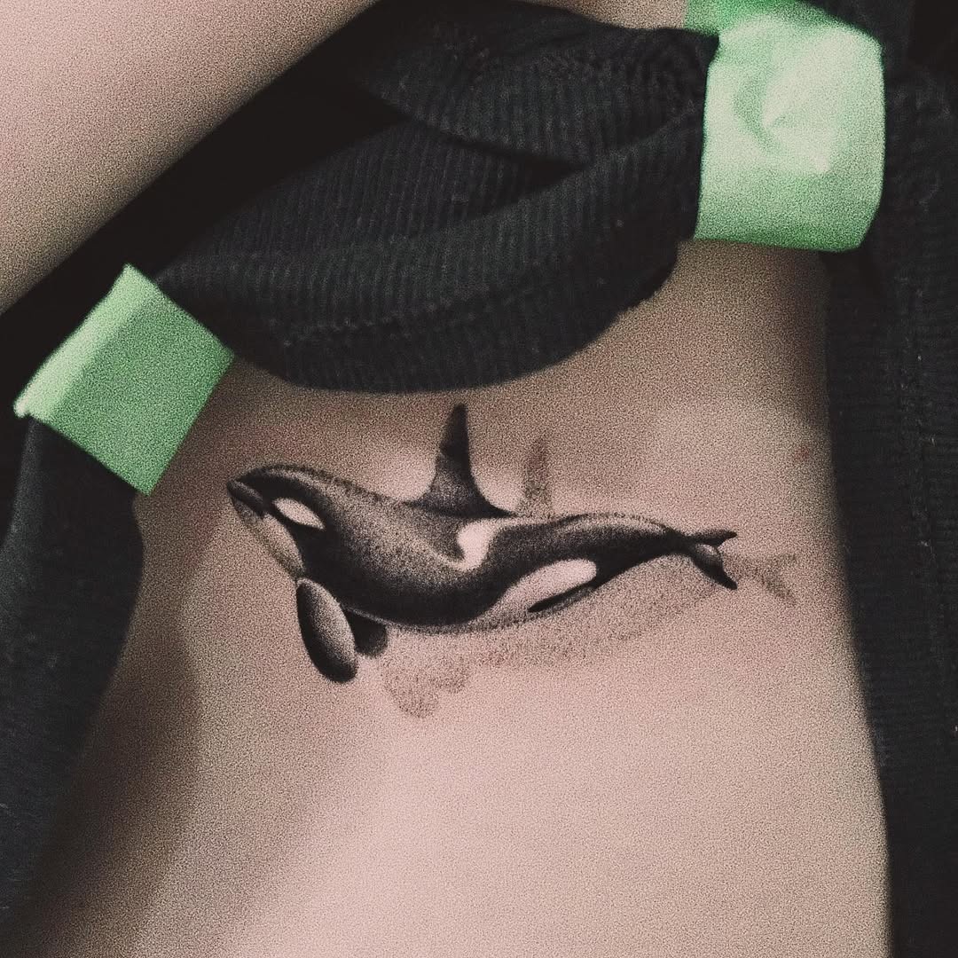 Delicate Orca Design with Fine Lines Tattoo Design
