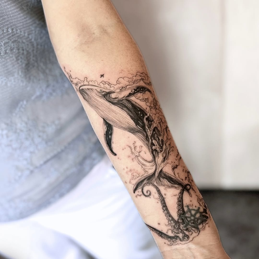 Elegant minimalist whale tattoo on the arm Tattoo Design
