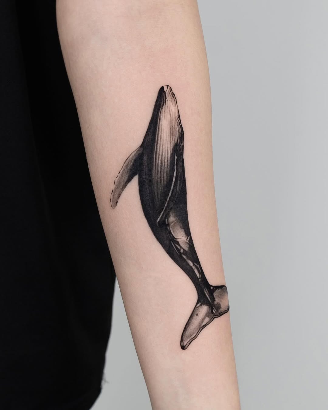 Stunning detailed whale tattoo on forearm Tattoo Design
