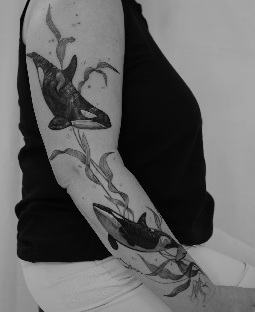 Stunning minimalist whale tattoo on the arm Tattoo Design