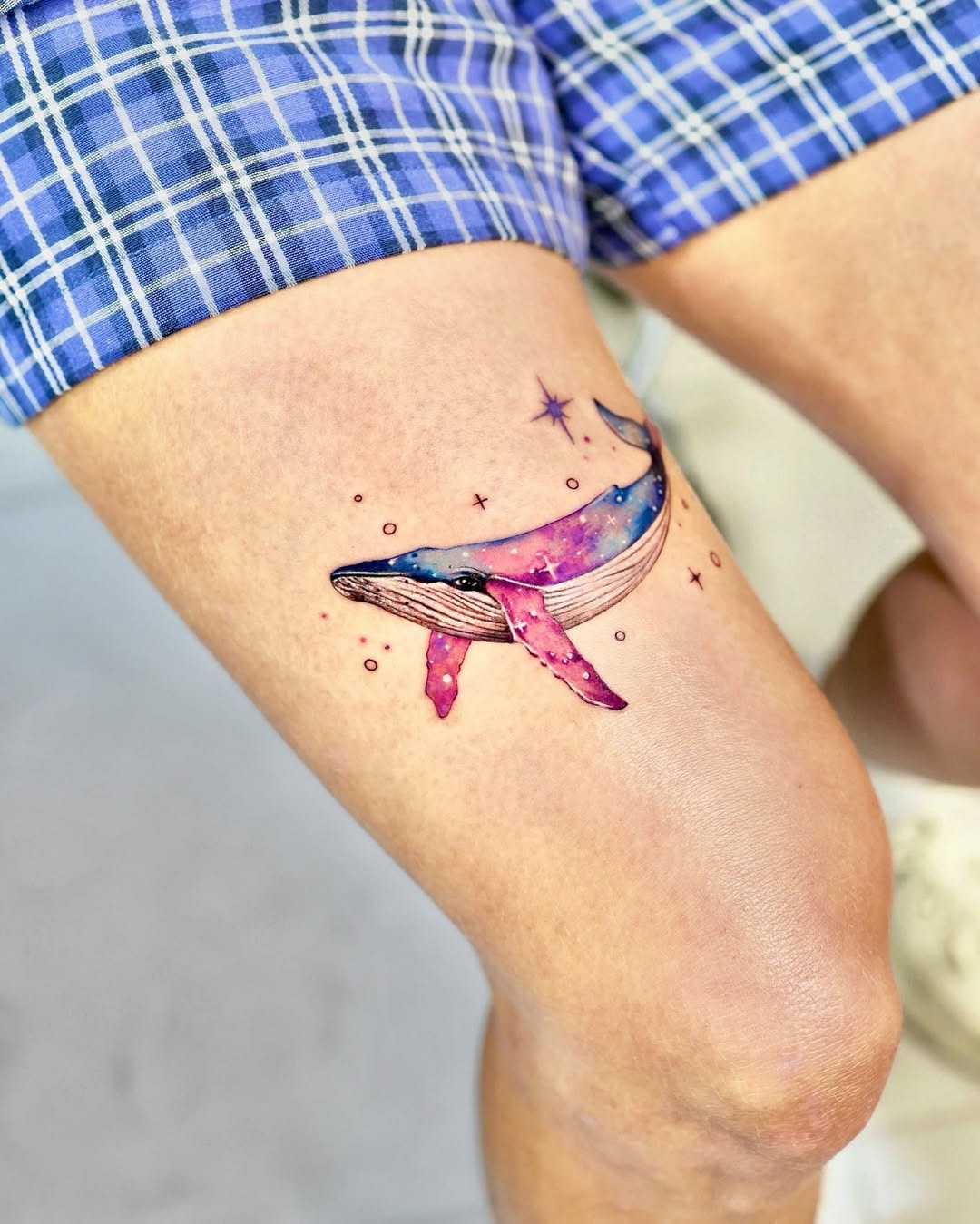 Vibrant whale tattoo with galaxy elements Tattoo Design
