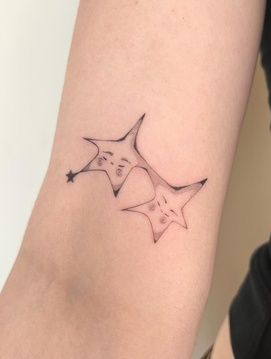 Charming star tattoos with playful expressions Tattoo Design