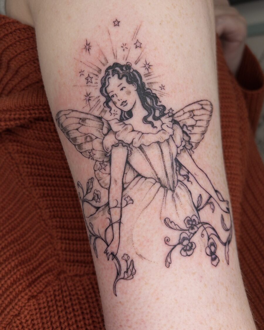 Delicate fairy tattoo radiating whimsical charm Tattoo Design