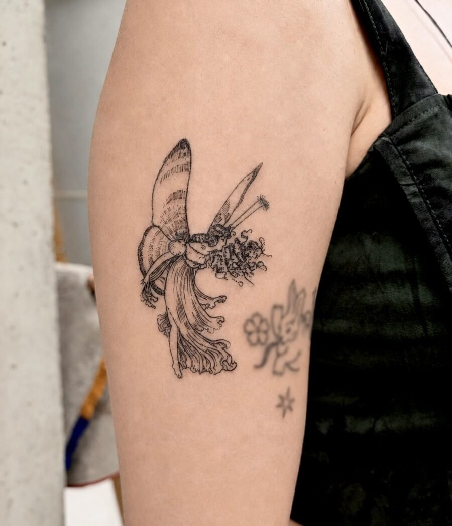 Enchanting fairy tattoo with whimsical flowers Tattoo Design