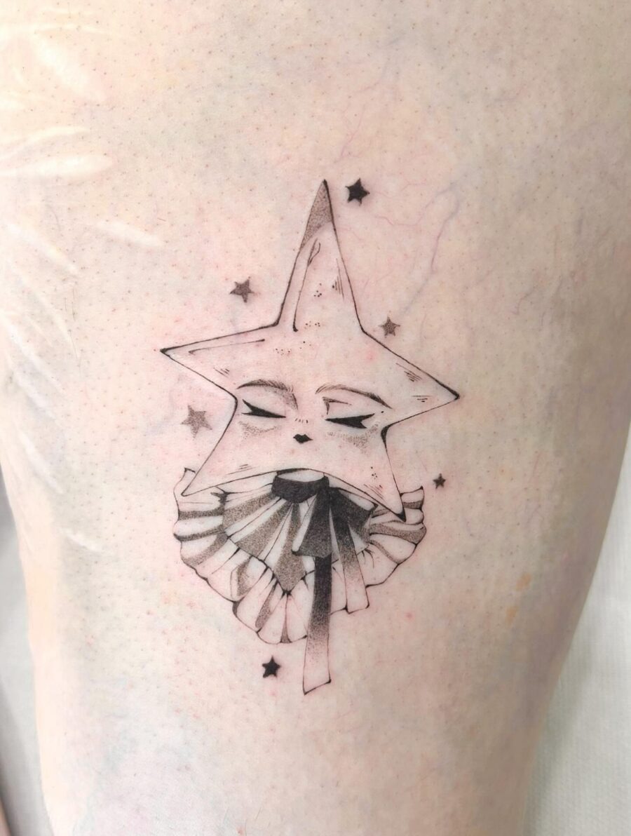 Enchanting whimsical star face tattoo Tattoo Design