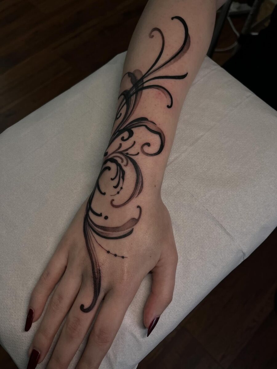 Intricate Floral Tattoo Design on the Arm Tattoo Design