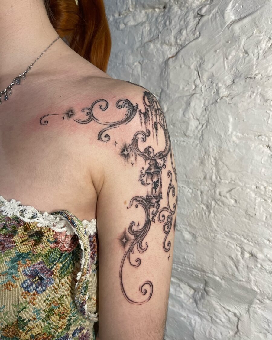 Intricately designed floral whimsy on shoulder Tattoo Design