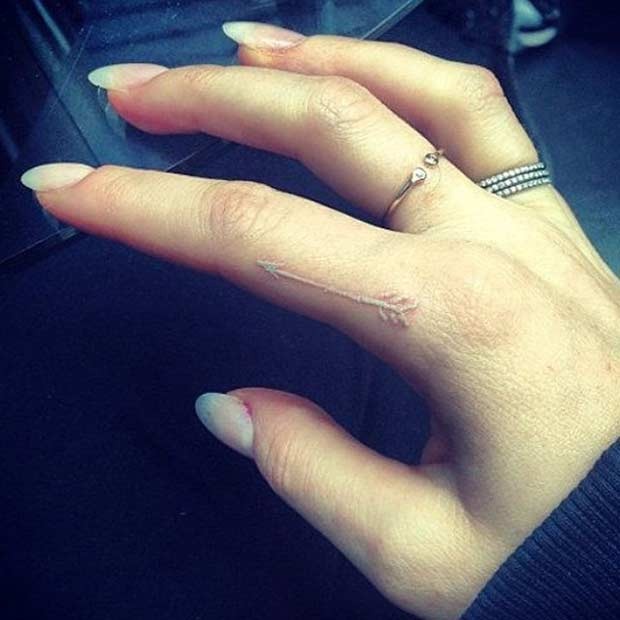 A Thin Arrow for Direction White Ink Tattoo Tattoo Design