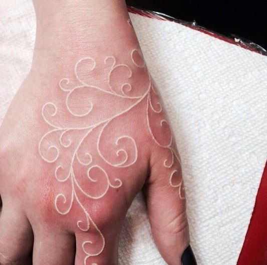 Accessorize Without the Flashy Jewelry on this White Ink Tattoo Tattoo Design