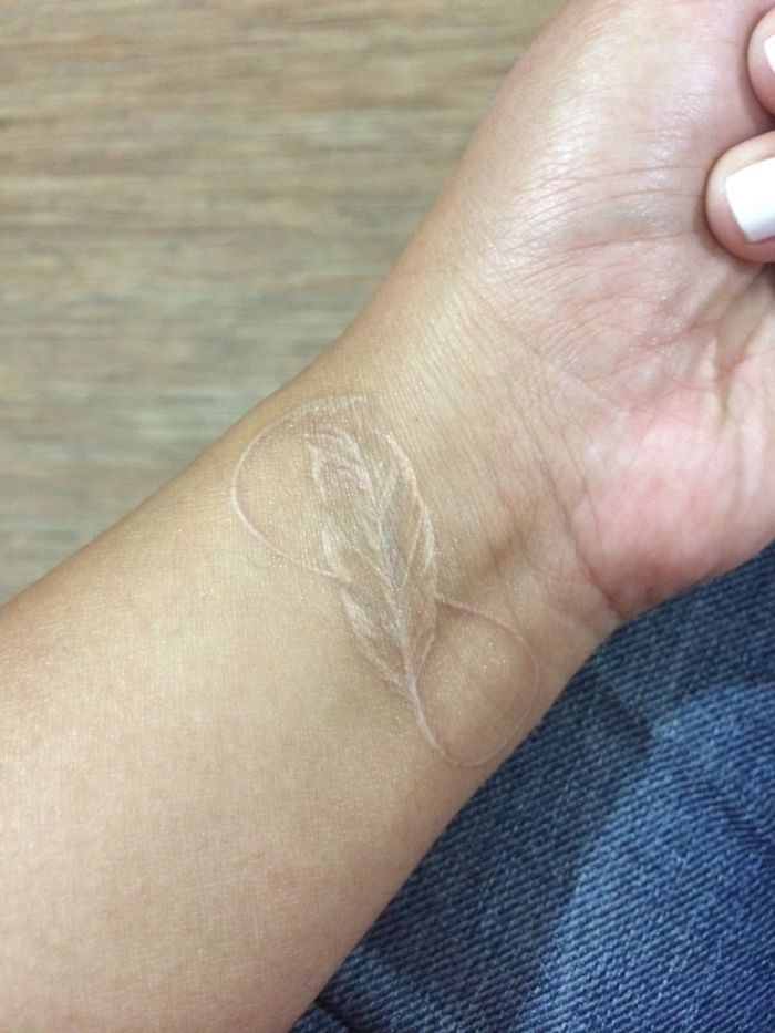 FloatingFlower Tattoowith Infinity Symbol White Ink Tattoo Tattoo Design