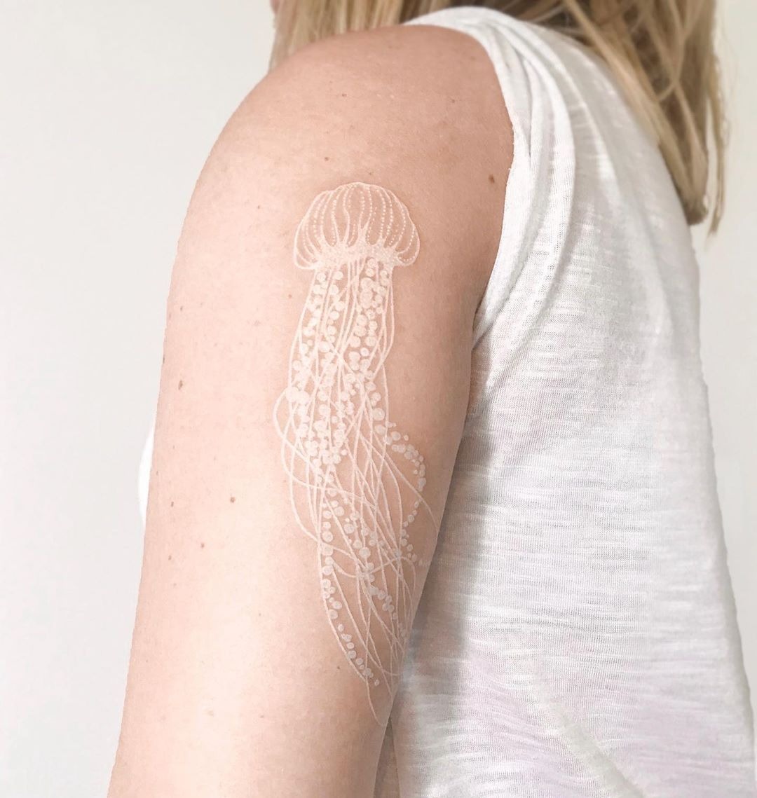 Modern Jellyfish White Ink Tattoo With Waving Tentacles Tattoo Design