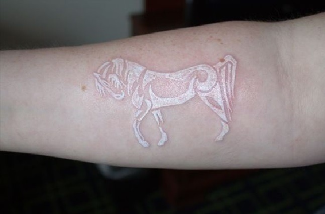 Power and Strength of a Tribal Horse White Ink Tattoo Tattoo Design