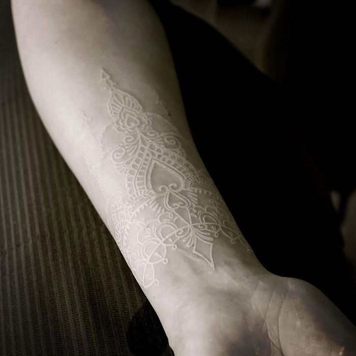Sticking With Tradition and Making it Permanent White Ink Tattoo Tattoo Design