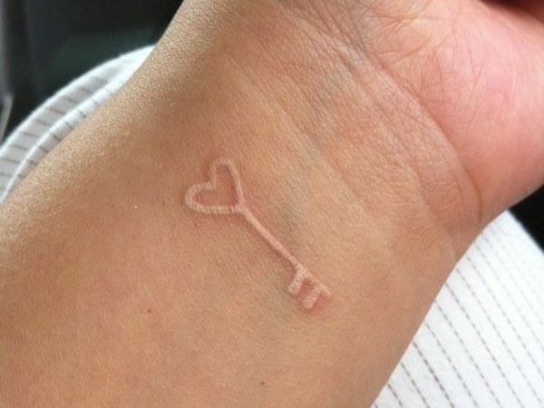 The Key to Unlocking the Heart White Ink Tattoo Tattoo Design