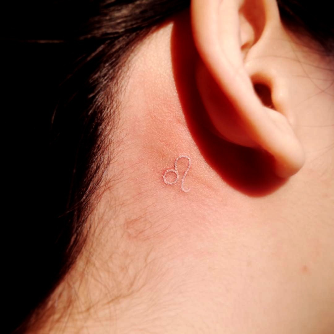 Understated Expression of Zodiac White Ink Tattoo Tattoo Design